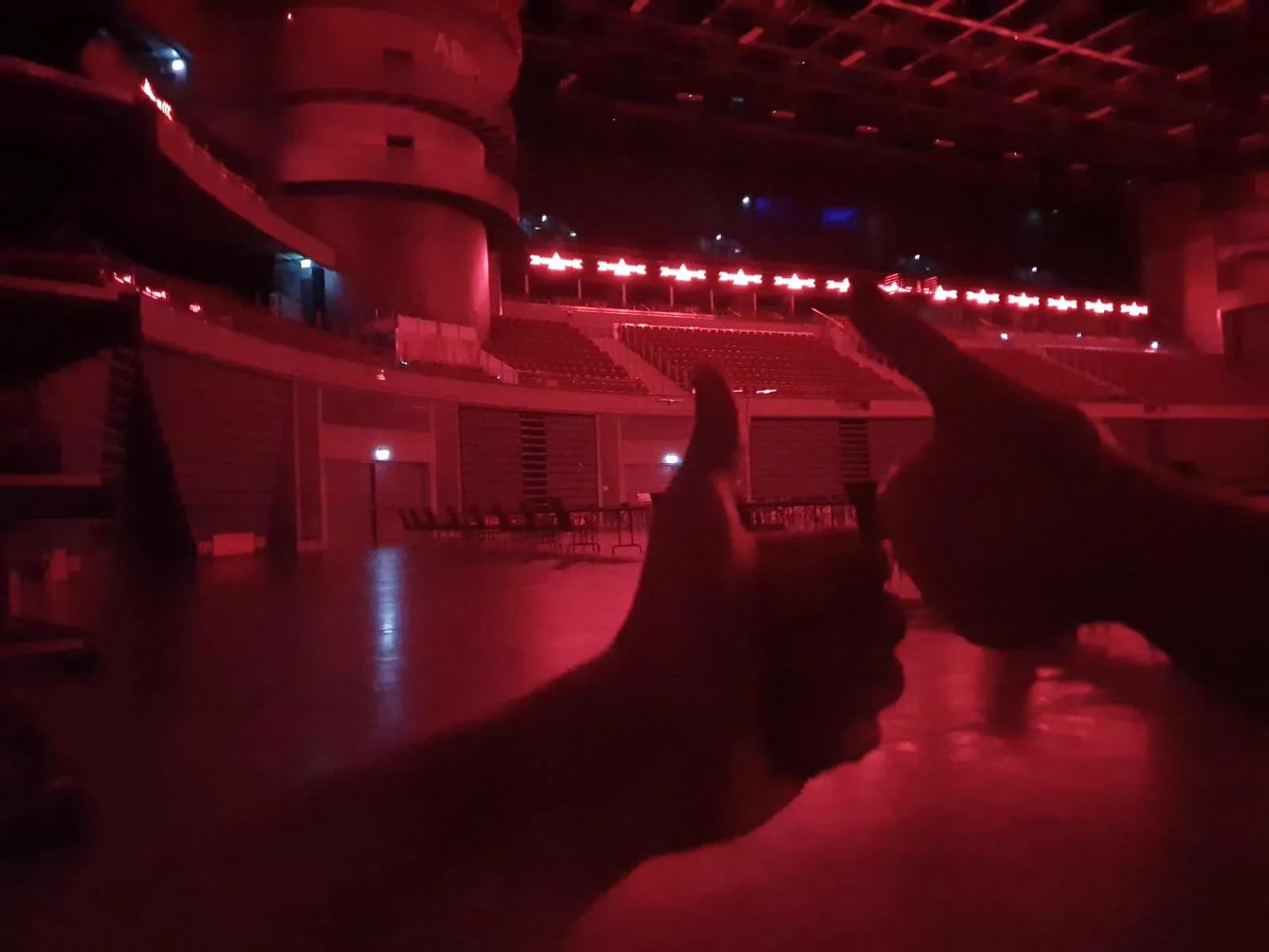 Event venue with atmospheric red lighting